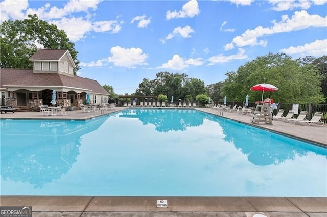 4300 May Apple Dr, Alpharetta, GA 30005 - community pool with a patio area