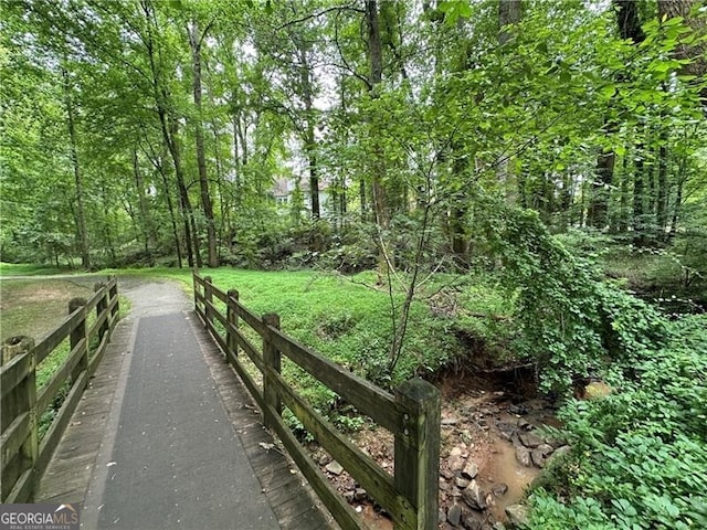 4300 May Apple Dr, Alpharetta, GA 30005 - view of property's community with a forest view and a yard
