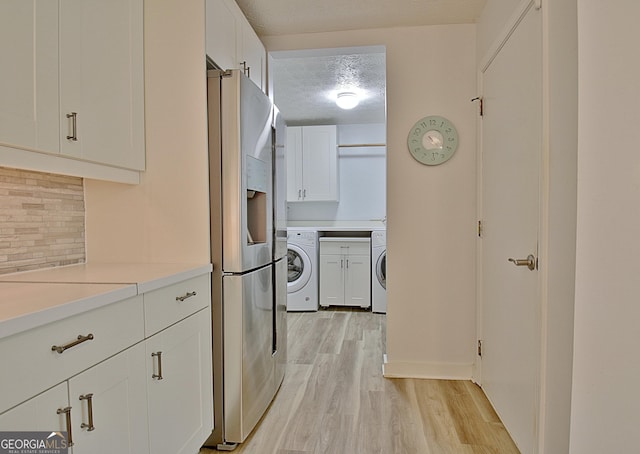 210 Grandchester Way, Fayetteville, GA 30215 - kitchen with stainless steel fridge with ice dispenser, washer / clothes dryer, light wood-type flooring, tasteful backsplash, and a textured ceiling