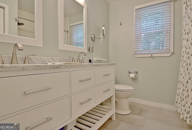210 Grandchester Way, Fayetteville, GA 30215 - bathroom with vanity, plenty of natural light, tile patterned floors, and a shower with shower curtain