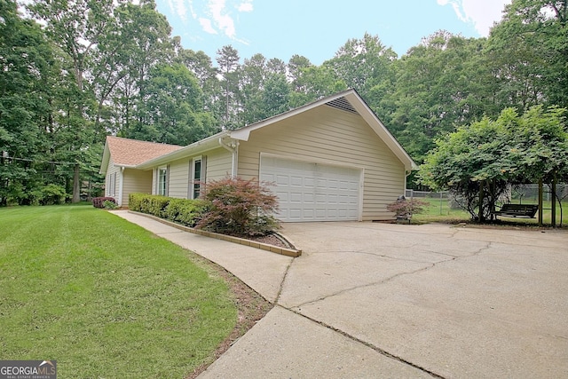 210 Grandchester Way, Fayetteville, GA 30215 - view of side of home featuring concrete driveway and an attached garage