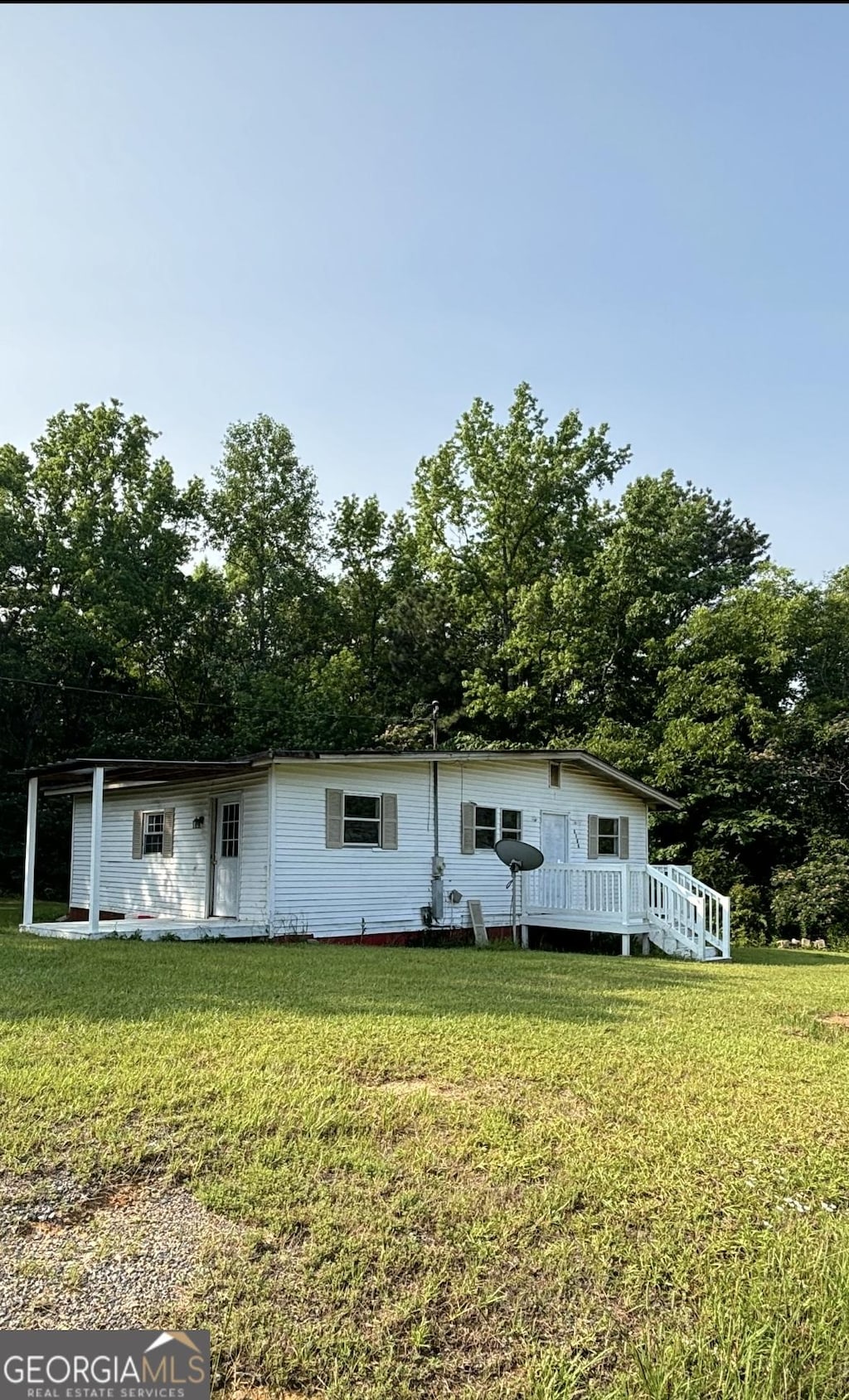1569 Ga Highway 128, Roberta, GA 31078 - view of front of property with a front yard and a wooden deck