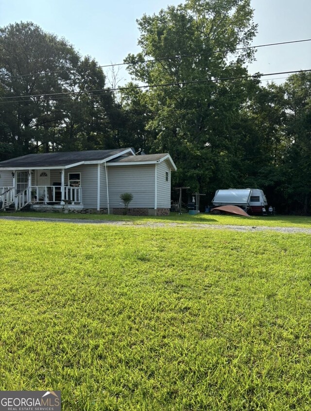 1569 Ga Highway 128, Roberta, GA 31078 - view of front of home with covered porch and a front yard