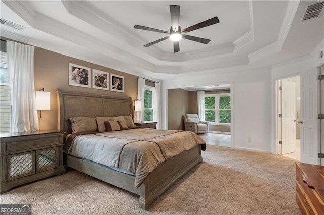 2772 Hillgrove Dr, Dacula, GA 30019 - bedroom featuring a raised ceiling, crown molding, carpet flooring, and a ceiling fan