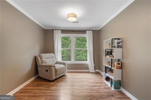 2772 Hillgrove Dr, Dacula, GA 30019 - sitting room featuring ornamental molding and wood finished floors