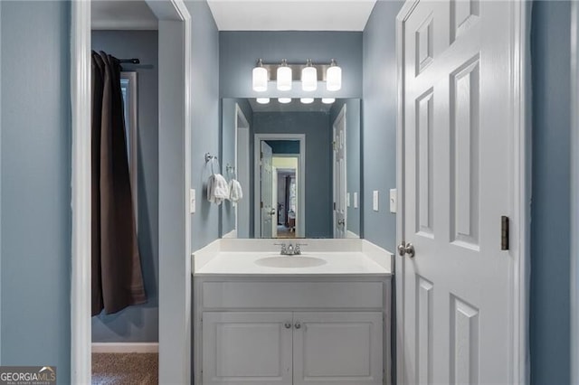2772 Hillgrove Dr, Dacula, GA 30019 - bathroom featuring vanity and baseboards