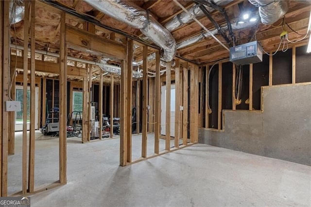 2772 Hillgrove Dr, Dacula, GA 30019 - miscellaneous room featuring plenty of natural light and unfinished concrete floors