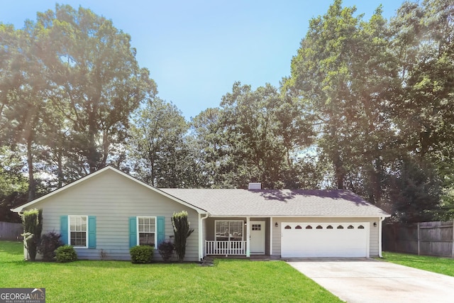 1421 Oak Knoll Dr NE, Conyers, GA 30012 - view of front of home with concrete driveway, a garage, and covered porch
