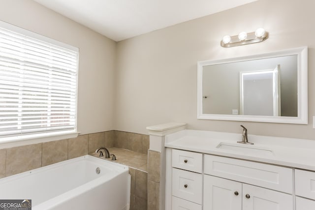 1421 Oak Knoll Dr NE, Conyers, GA 30012 - bathroom with vanity and a bath