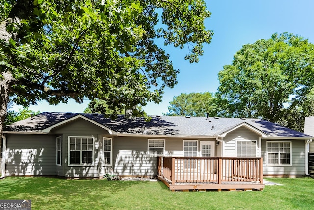 1421 Oak Knoll Dr NE, Conyers, GA 30012 - back of property featuring a deck and a yard