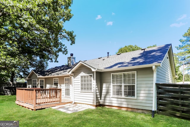1421 Oak Knoll Dr NE, Conyers, GA 30012 - back of house with a wooden deck, a chimney, and roof with shingles
