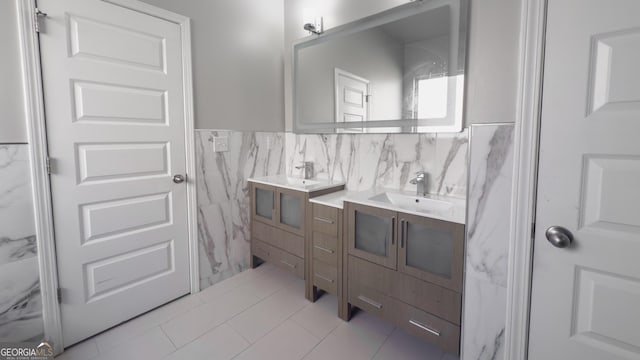3368 Alhambra Cir, Hampton, GA 30228 - bathroom with tile walls, vanity, tile patterned flooring, and a wainscoted wall