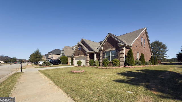 3368 Alhambra Cir, Hampton, GA 30228 - view of front facade featuring brick siding, concrete driveway, a front yard, a garage, and a residential view