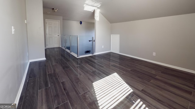 3368 Alhambra Cir, Hampton, GA 30228 - additional living space featuring dark wood-style floors and baseboards