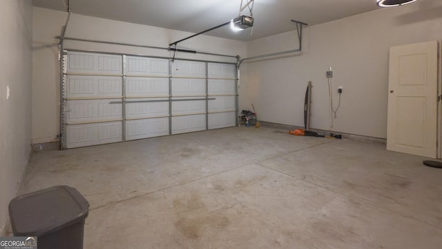 3368 Alhambra Cir, Hampton, GA 30228 - garage featuring a garage door opener