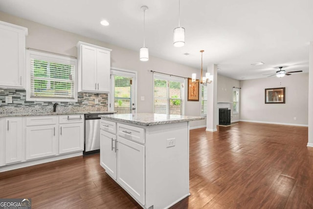255 Hamilton Dr, Newnan, GA 30263 - kitchen featuring dark wood-type flooring, backsplash, open floor plan, plenty of natural light, and recessed lighting