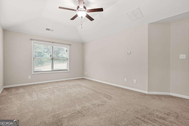 255 Hamilton Dr, Newnan, GA 30263 - carpeted empty room with a ceiling fan and vaulted ceiling