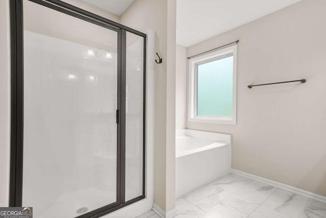 255 Hamilton Dr, Newnan, GA 30263 - full bath featuring a stall shower, marble finish flooring, and a garden tub