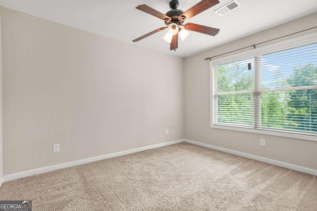 255 Hamilton Dr, Newnan, GA 30263 - carpeted spare room featuring baseboards and ceiling fan