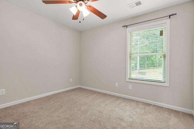 255 Hamilton Dr, Newnan, GA 30263 - carpeted empty room with baseboards and ceiling fan