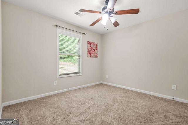 255 Hamilton Dr, Newnan, GA 30263 - carpeted empty room featuring a ceiling fan and baseboards