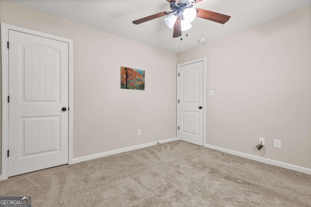 255 Hamilton Dr, Newnan, GA 30263 - spare room with carpet flooring, ceiling fan, and a smoke detector
