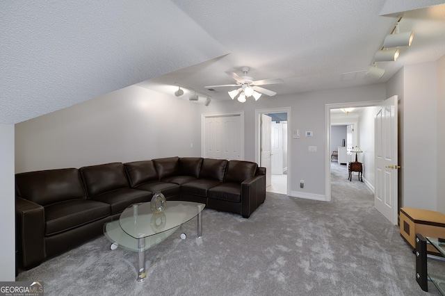 1000 Collingtree Ct, Mcdonough, GA 30253 - carpeted living room featuring track lighting, a ceiling fan, and a textured ceiling