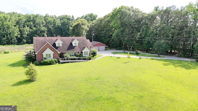 4494 Anderson Hwy, Hartwell, GA 30643 - cape cod-style house with a garage, a front lawn, a wooded view, and a chimney