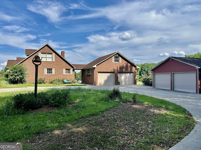 4494 Anderson Hwy, Hartwell, GA 30643 - view of front of home with brick siding, a garage, and a chimney