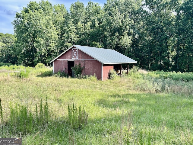 4494 Anderson Hwy, Hartwell, GA 30643 - view of pole building featuring a wooded view