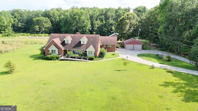4494 Anderson Hwy, Hartwell, GA 30643 - cape cod house featuring a garage, a front lawn, a chimney, and a wooded view