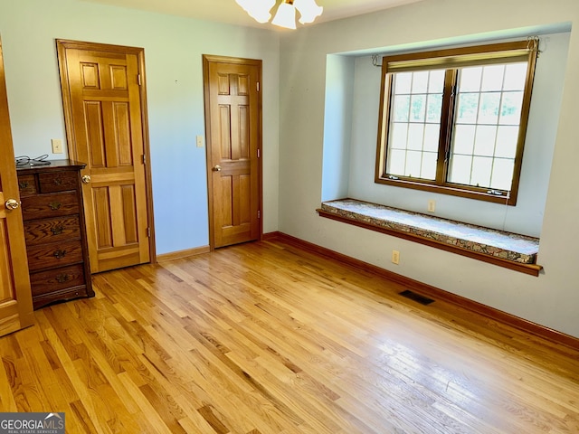 4494 Anderson Hwy, Hartwell, GA 30643 - unfurnished bedroom with light wood finished floors and baseboards