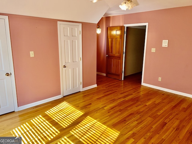 4494 Anderson Hwy, Hartwell, GA 30643 - unfurnished room with light wood-style floors and lofted ceiling