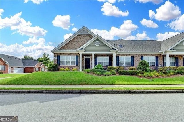 3411 Lindenridge Dr, Buford, GA 30519 - view of front facade featuring a front lawn and brick siding