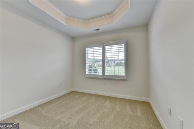 3411 Lindenridge Dr, Buford, GA 30519 - carpeted spare room featuring a tray ceiling and ornamental molding
