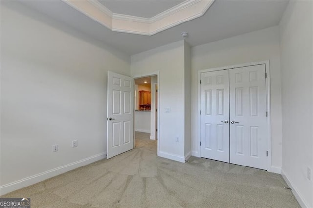 3411 Lindenridge Dr, Buford, GA 30519 - unfurnished bedroom featuring carpet floors, crown molding, and a closet
