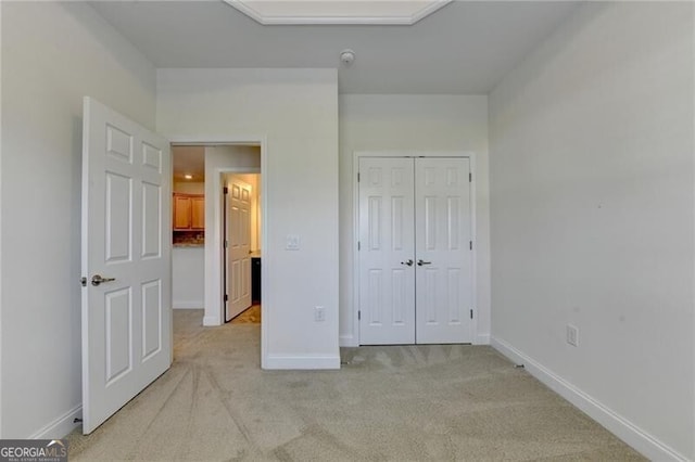 3411 Lindenridge Dr, Buford, GA 30519 - unfurnished bedroom featuring light colored carpet and a closet