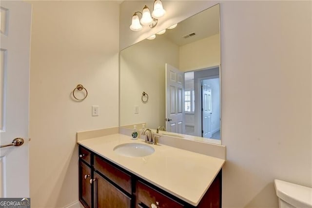 3411 Lindenridge Dr, Buford, GA 30519 - bathroom with vanity and toilet
