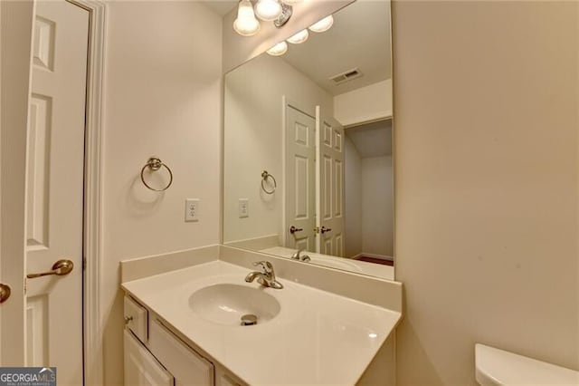 3411 Lindenridge Dr, Buford, GA 30519 - half bath with vanity and toilet