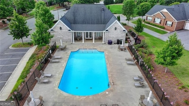 3411 Lindenridge Dr, Buford, GA 30519 - view of pool with french doors and a patio