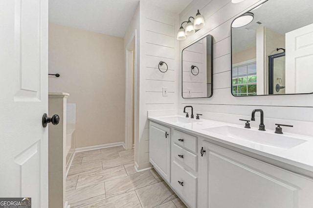 4210 Platinum Ct, Hoschton, GA 30548 - bathroom featuring double vanity, a shower, marble look tiles, and a bath