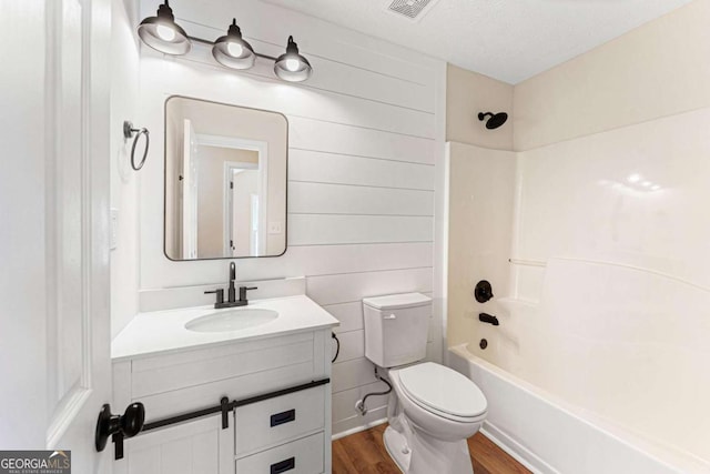 4210 Platinum Ct, Hoschton, GA 30548 - bathroom featuring vanity, wood finished floors, and shower / bath combination