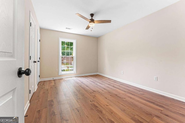 4210 Platinum Ct, Hoschton, GA 30548 - unfurnished room featuring hardwood / wood-style flooring and a ceiling fan