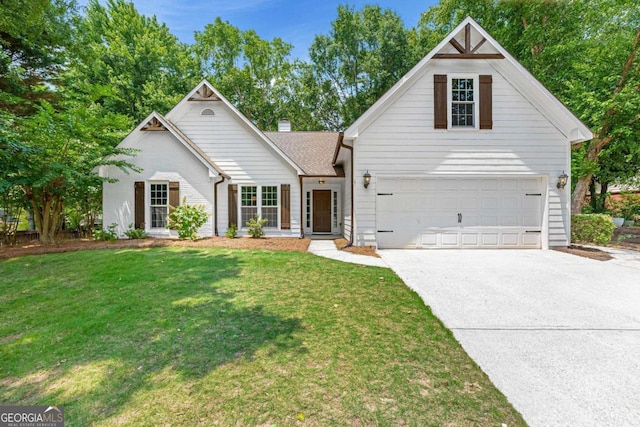 4210 Platinum Ct, Hoschton, GA 30548 - traditional-style house with driveway, a front yard, and a chimney