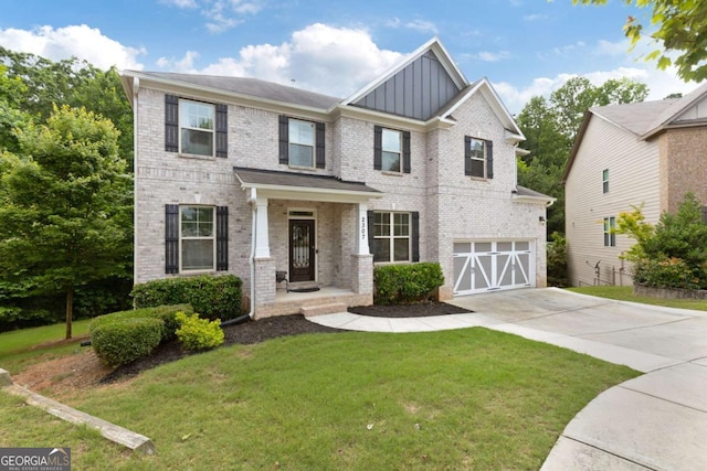 2307 Loughridge Dr, Buford, GA 30519 - craftsman inspired home featuring board and batten siding, concrete driveway, an attached garage, a front lawn, and brick siding