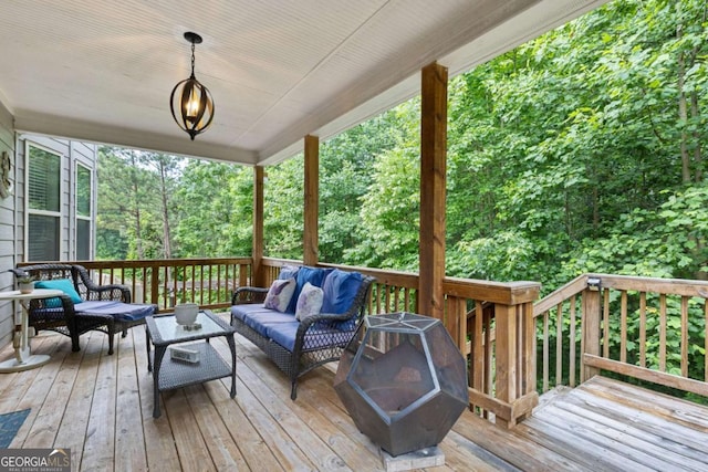 2307 Loughridge Dr, Buford, GA 30519 - wooden deck with an outdoor living space with a fire pit