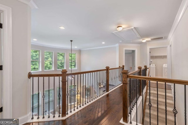 2307 Loughridge Dr, Buford, GA 30519 - corridor featuring washer and clothes dryer, attic access, hardwood / wood-style floors, crown molding, and an upstairs landing