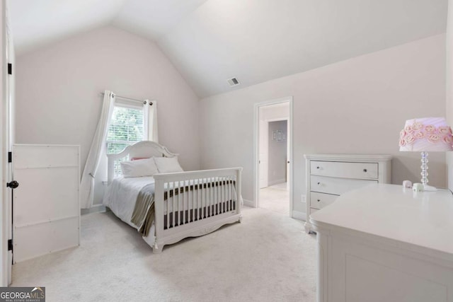 2307 Loughridge Dr, Buford, GA 30519 - bedroom featuring vaulted ceiling and light carpet
