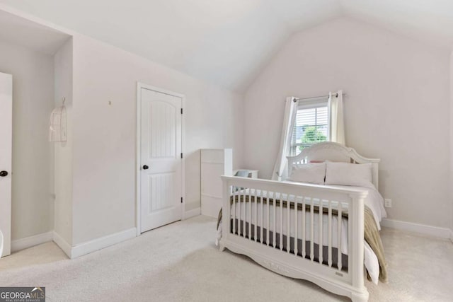 2307 Loughridge Dr, Buford, GA 30519 - bedroom with lofted ceiling and carpet