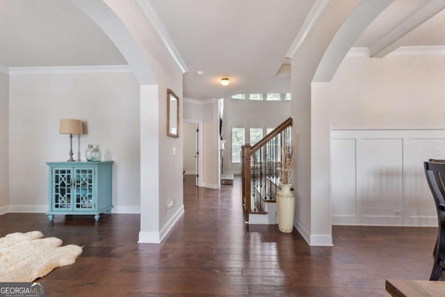 2307 Loughridge Dr, Buford, GA 30519 - entryway featuring arched walkways, hardwood / wood-style floors, ornamental molding, and stairway